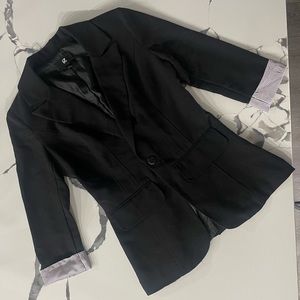Women’s black suit jacket
